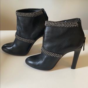 Alaia size 38.5 black leather boot w/ chain detail